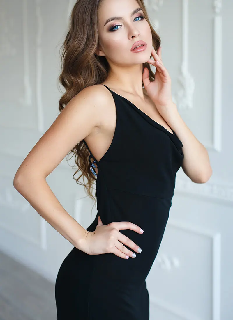 Thin woman in black dress