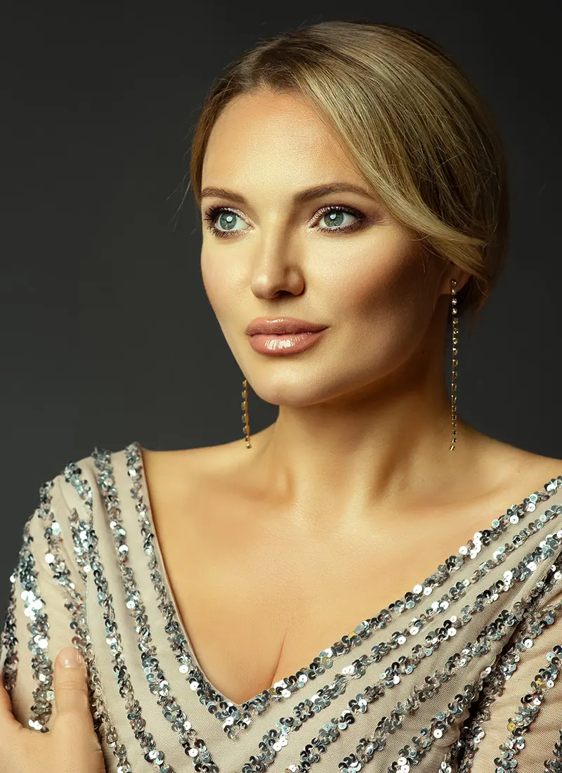 Beautiful woman in a sparkly shirt