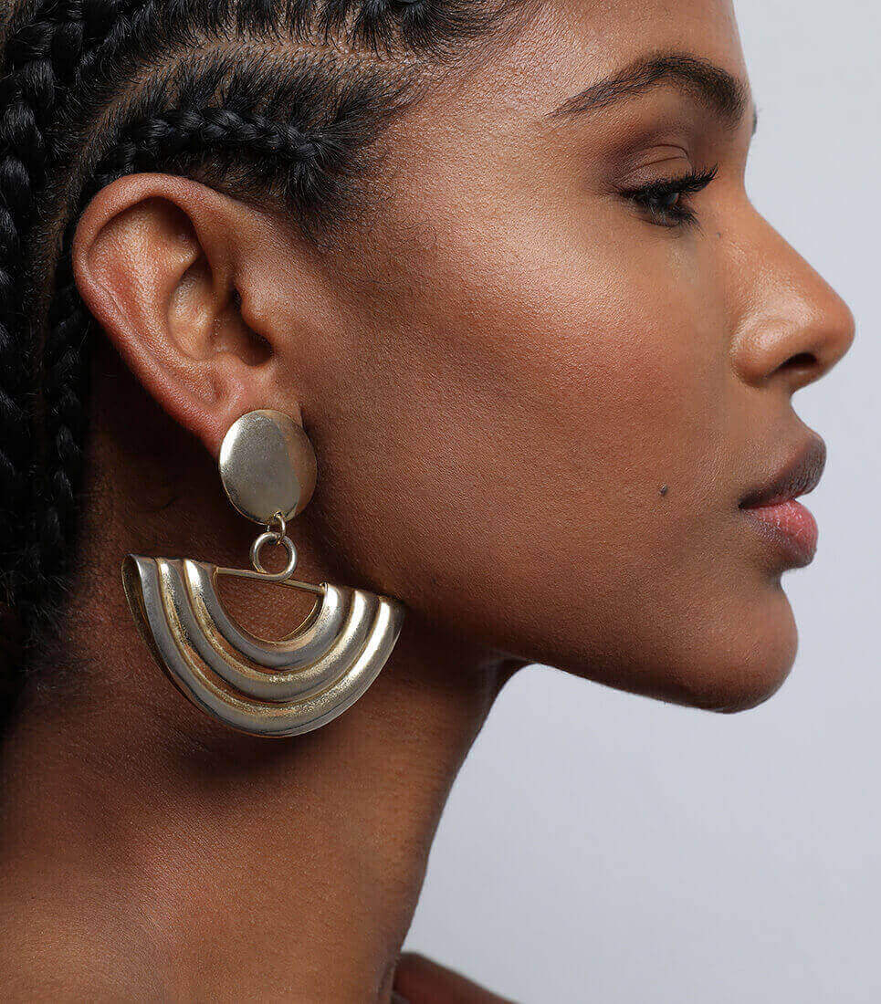 profile of a woman wearing earring